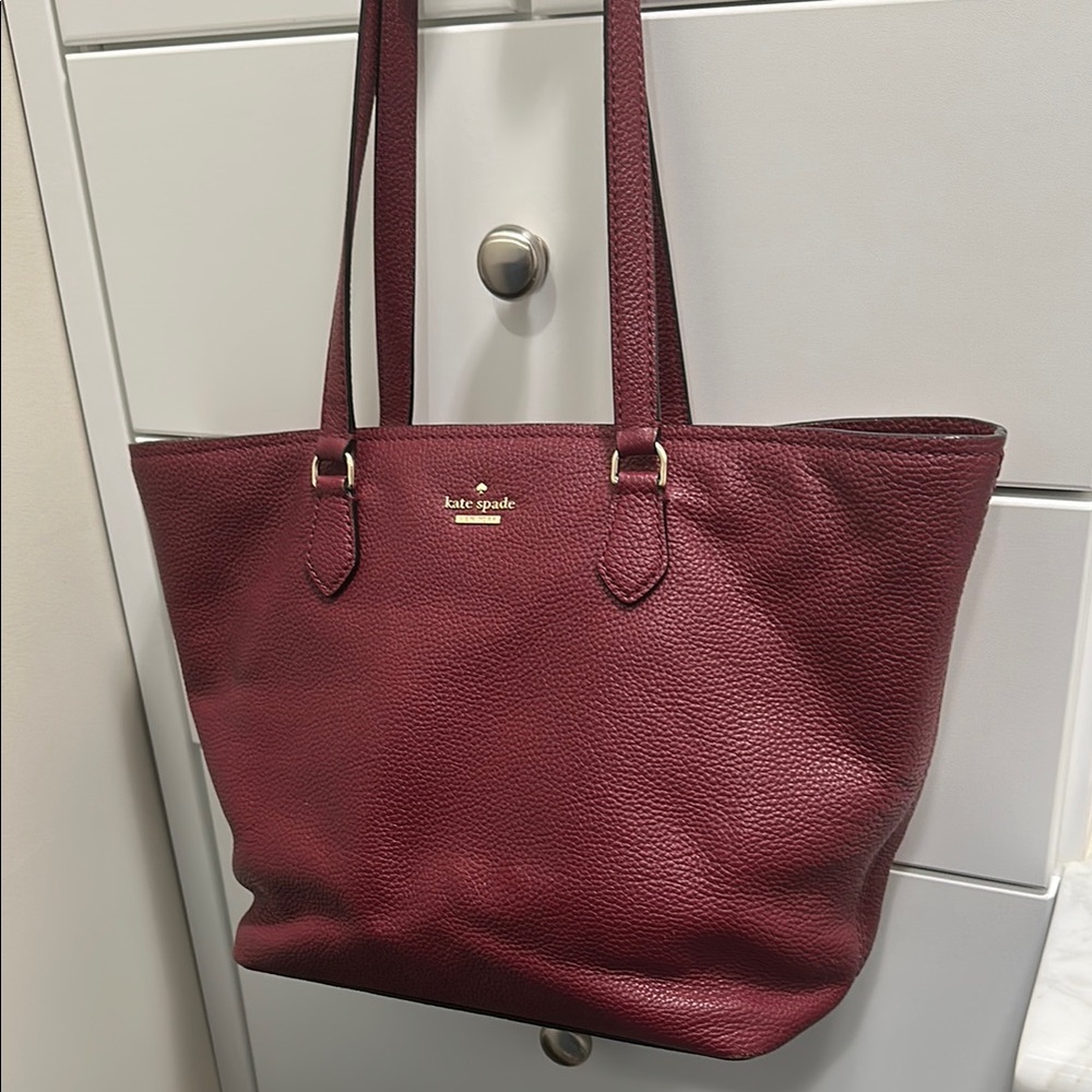 KATE SPADE Burgundy Pebble Leather Tote Bag with Gold Accents